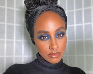 Woman with blue eye shadow
