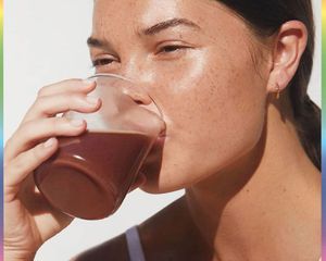 woman drinking protein powder drink