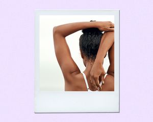 Woman stretching arm