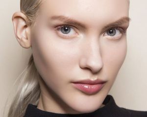 woman wearing lip gloss