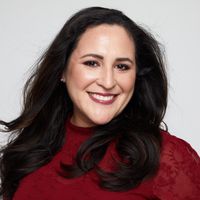 Celia Shatzman, a contributing writer for Byrdie poses for a headshot