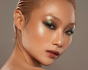Close up of a model wearing a face full of makeup from Danessa Myricks Beauty.