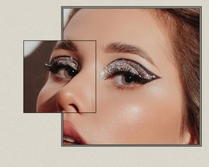 Close up of a woman's eyes. She is wearing false lashes and eyeliner.