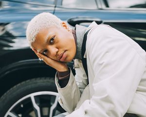 person with bleached platinum eyebrows hair