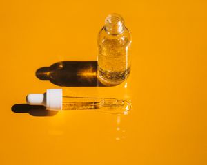 oat oil on yellow background