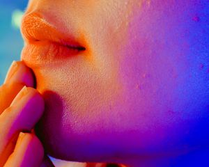 woman with skin purging along cheeks