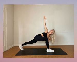 Fitness instructor performs a lunge.