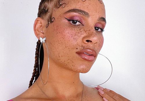 woman with hair gems