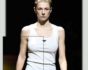 Hunter Schafer wearing a white Prada tank top.
