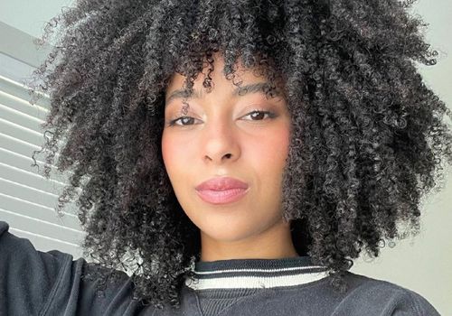 Portrait of WOC with Natural Hair 