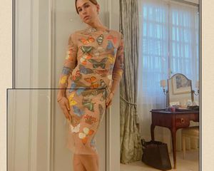 Tommy Dorfman wearing Tyler McGillvary dress.