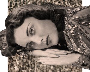 woman laying on glitter background