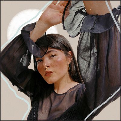 woman in black with hands in air 