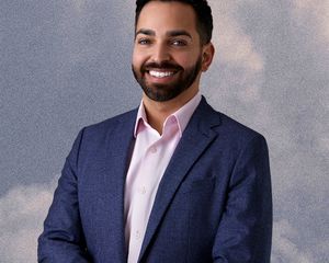 dr. shah poses for a headshot