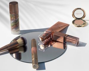 Stila products on a mirror and a white background