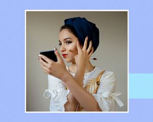 Young women doing her makeup