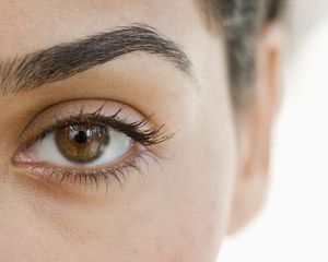 A closeup shot of a woman's eye and eyebrows