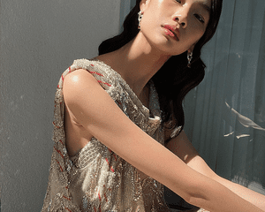 HoYeon Jung wearing a gold dress at the 2022 critics choice awards