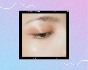 close up of a woman's eye and eyebrow