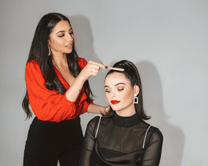 justine marjan styling woman's hair