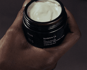 Klur night cream in hand