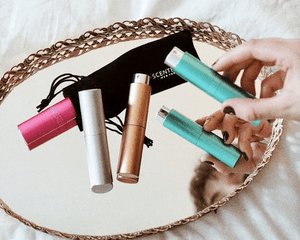 scentbird fragrances on a gold-rimmed mirror