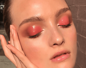 woman wearing metallic shadow