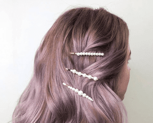 woman with pearl clips in lavender hair