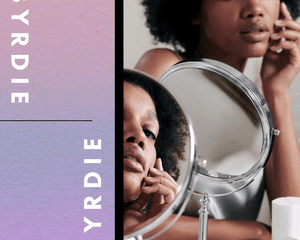 woman looking into mirror at eyelid breakout